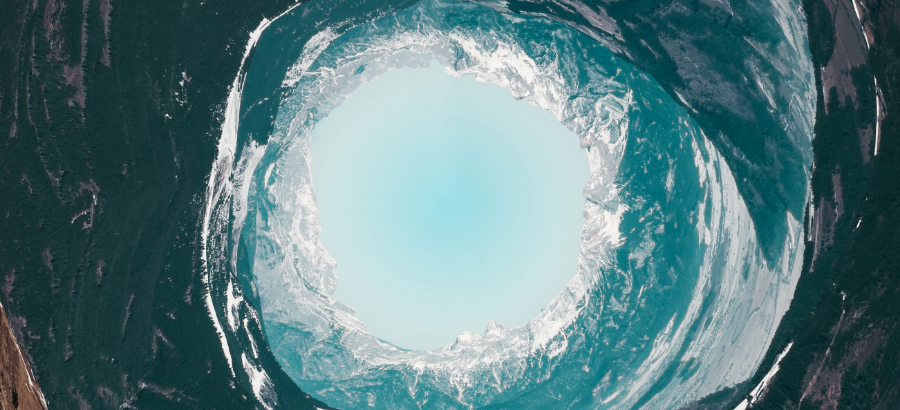 Tunnel looking into icy landscape