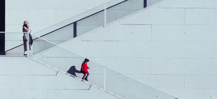 Two people in a monotone of stairs