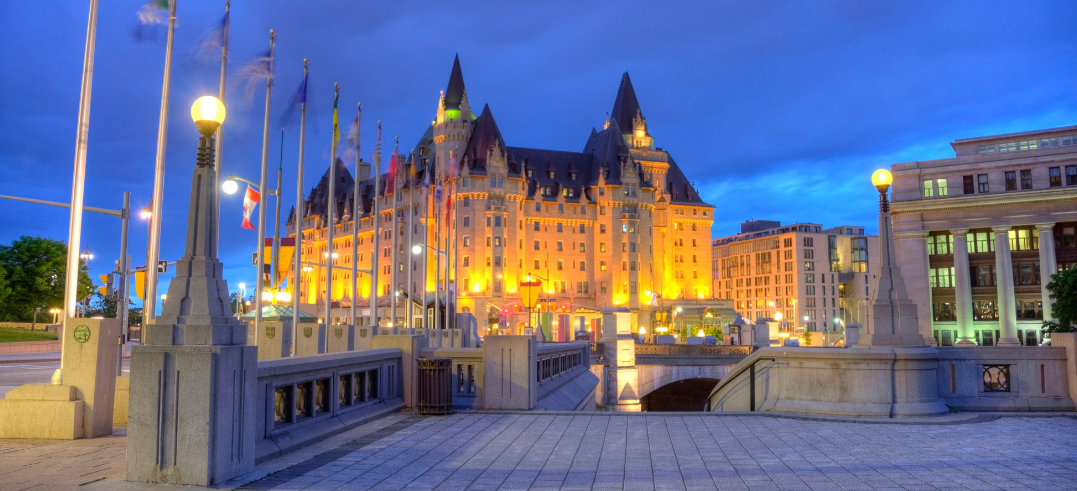 Ottawa parliament building lit up at night 
