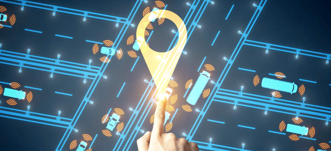 A finger pushes a digital button that sends signals to vehicles moving in different directions on highways